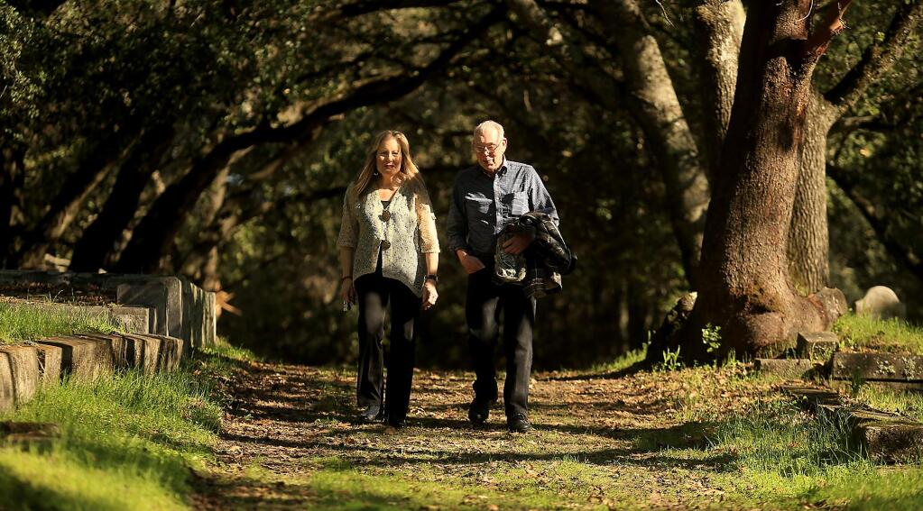 Sandy Frary and Ray Owen have spent hours upon hours in completing a book about those buried in Santa Rosa's Rural Cemetery, Thursday Nov. 11, 2016. (Kent Porter / The Press Democrat) 2016
