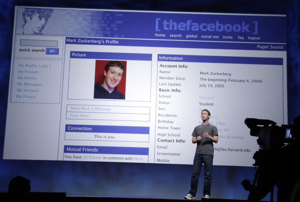 FILE- In this Sept. 22, 2011, file photo Facebook CEO Mark Zuckerberg talks about an old Facebook web site during the F8 conference in San Francisco. Naomi Gleit, Facebook's longest-serving employee after the CEO, said Zuckerberg has been talking about making the world a better place since he was 21. But his view of that world and his place in it 'seemed almost like a gravity, a burden of responsibility,' she said. (AP Photo/Paul Sakuma, File)
