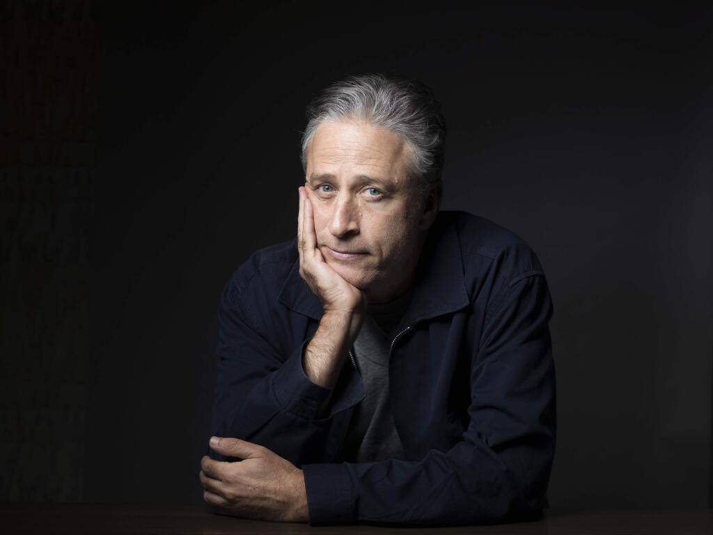 FILE - In this Nov. 7, 2014 file photo, Jon Stewart poses for a portrait in promotion of his film,'Rosewater,' in New York. Comedy Central announced Tuesday, Feb. 10, 2015, that Stewart will will leave 'The Daily Show' later this year. (Photo by Victoria Will/Invision/AP, File)