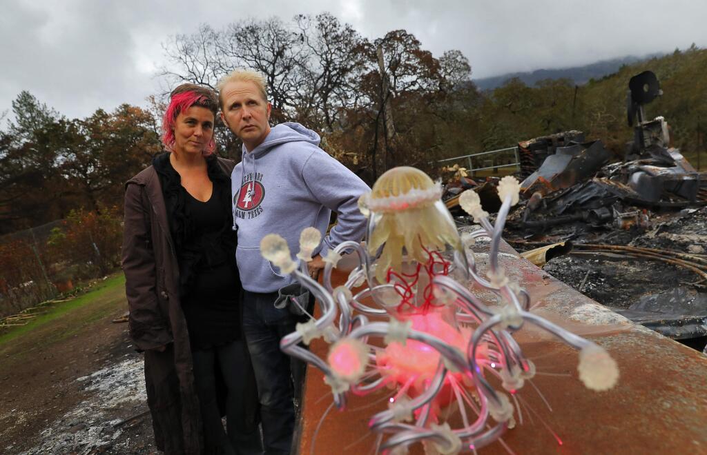 Sculpture artist Erick Dunn and his filmmaker wife Claudia Meglin lost everything when their Kenwood home and work studio was destroyed in the fires last month. The two artists are recipients of a grant fund created by Creative Sonoma, in an effort to give something back to the artists who were affected by the fires. In the foreground is one of Dunn's bioluminoid sculptures.(Christopher Chung/ The Press Democrat)
