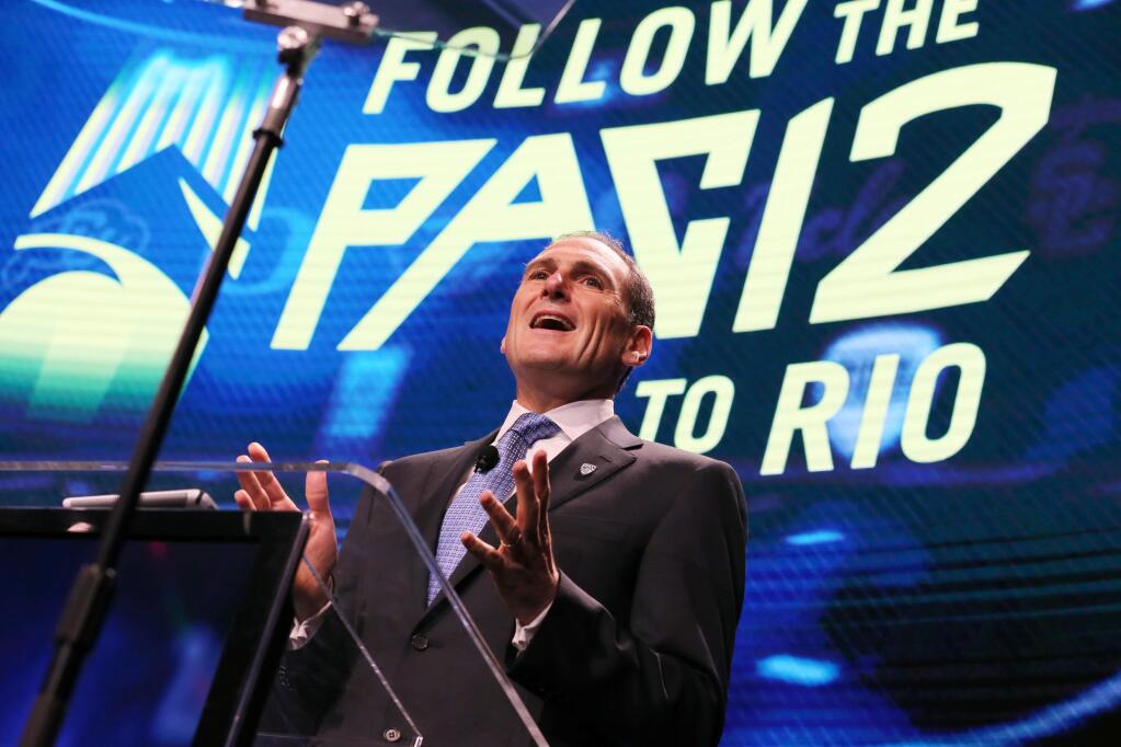Pac-12 commissioner Larry Scott speaks at the Pac-12 NCAA college football media day in Los Angeles Thursday, July 14, 2016. (AP Photo/Reed Saxon)