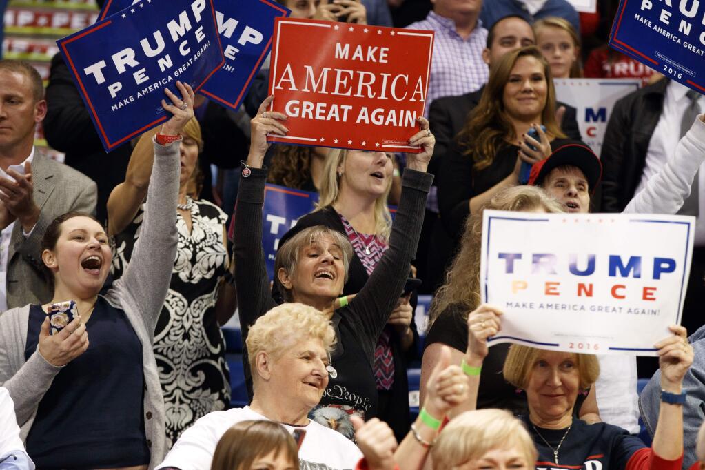 Supporters cheer Donald Trump at a 2016 rally in Wikes-Barre, Pennsylvania. (EVAN VUCCI / Associated Press)