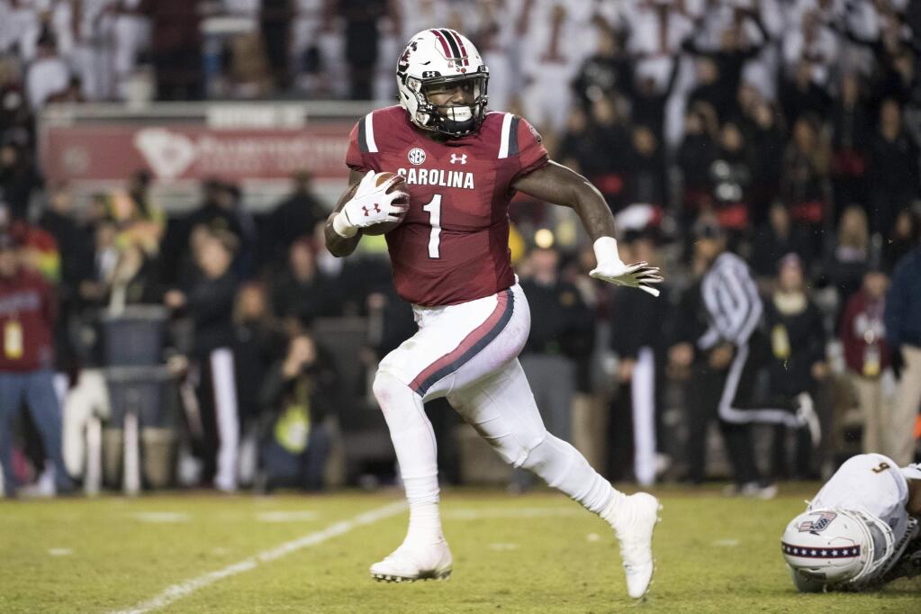 South Carolina wide receiver Deebo Samuel breaks away for a touchdown during the second half against Chattanooga Saturday, Nov. 17, 2018, in Columbia, S.C. (AP Photo/Sean Rayford)