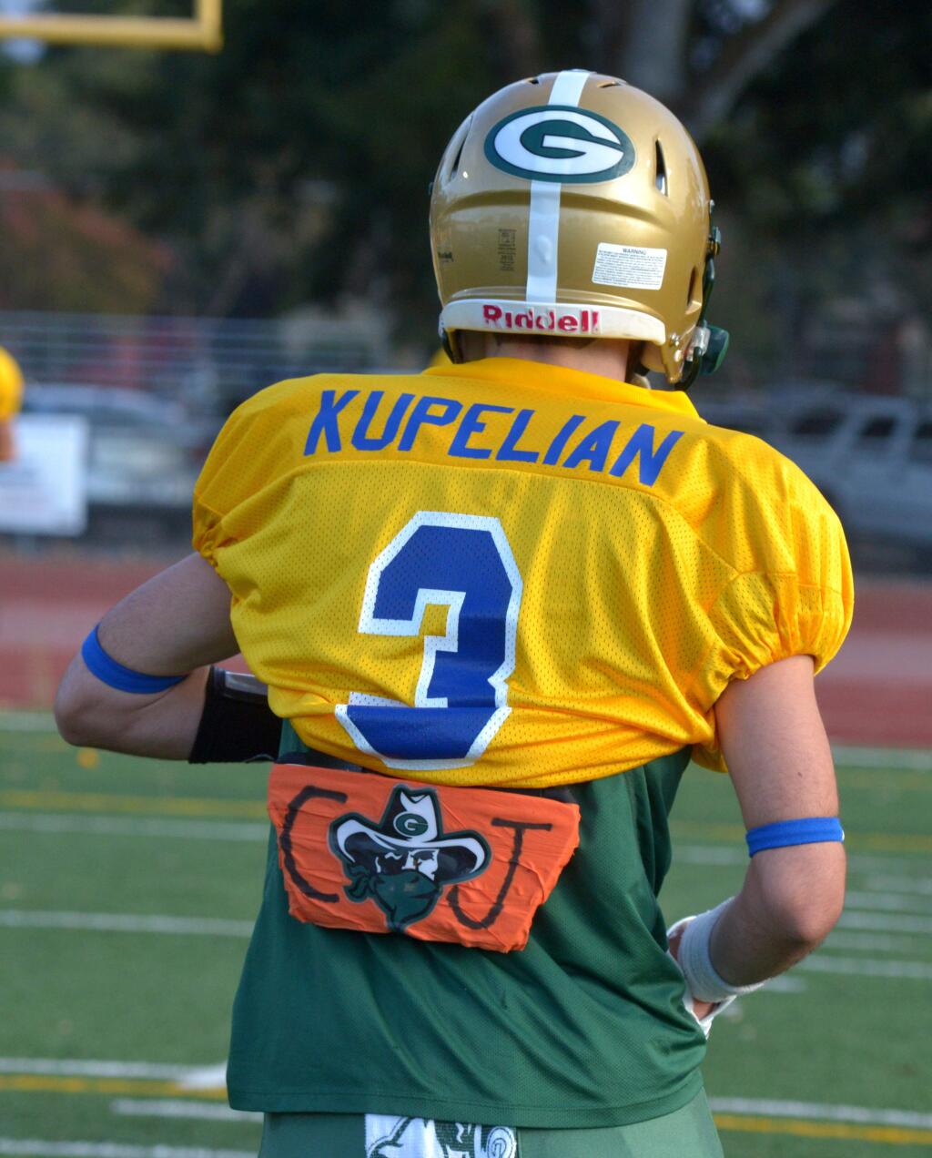 SUMNER FOWLERCasa Grande players like Andre Kupelian honored their young friend CJ Banaszek, who, just days before the game, had lost his battle with leukemia.