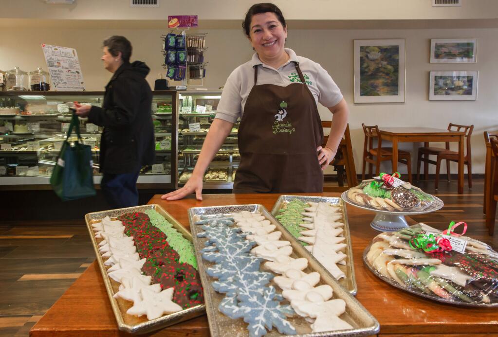 Robbi Pengelly/Index-TribuneScandia Bakery owner Marcela Rodriguez bakes plenty of extra Christmas cookies to keep up with the demand around the holidays.