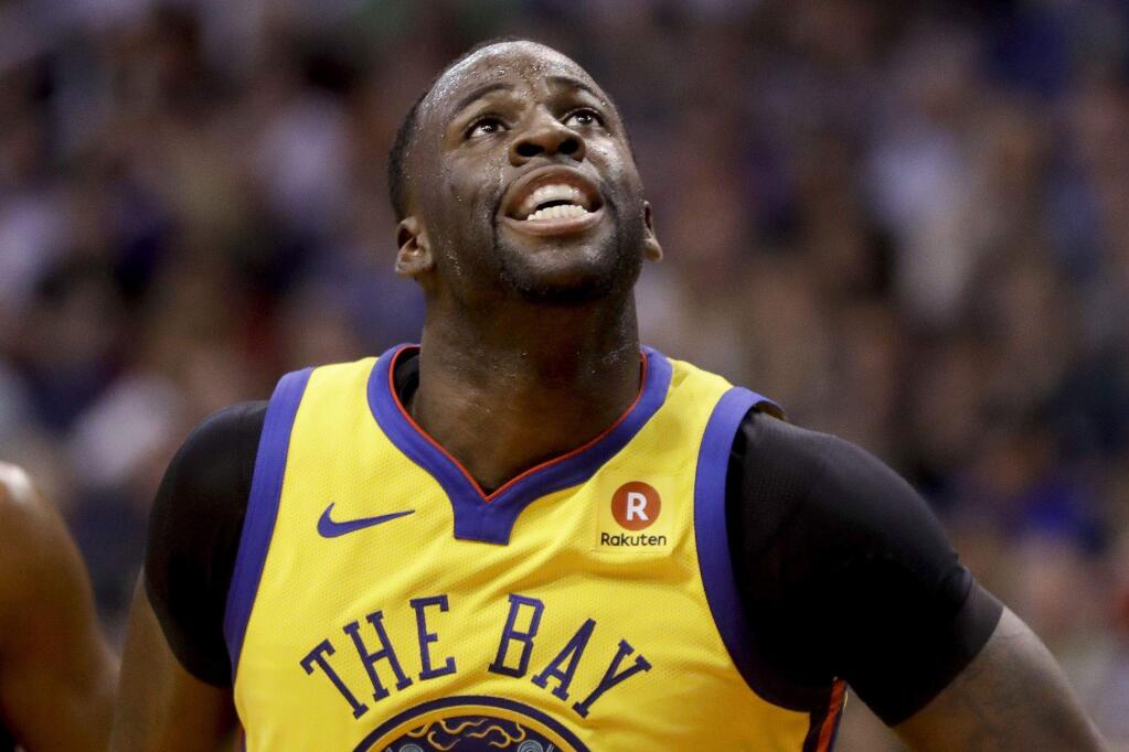 Golden State Warriors forward Draymond Green plays against the Phoenix Suns during an NBA basketball game in Phoenix, Sunday, March 18, 2018. (AP Photo/Chris Carlson)