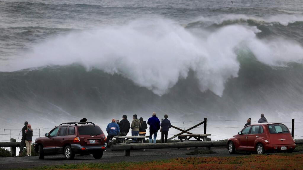 Large waves crash ashore at Duncan's Landing on Monday, Dec. 17, 2018. (KENT PORTER/ PD)