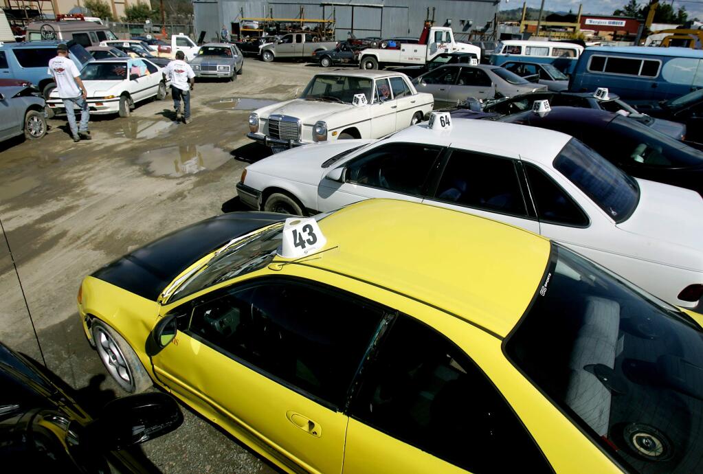 The impound yard at Cream's Towing in Santa Rosa in 2006. (KENT PORTER/ PD FILE)