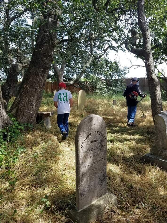 Members of the Canfield 4-H Club clean up the historic Canfield Cemetery in May 2016. (Photo from Canfield 4-H Club)