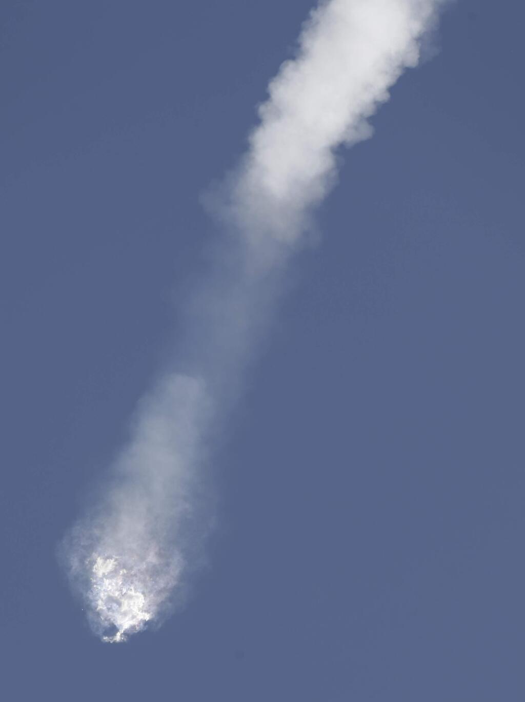 The SpaceX Falcon 9 rocket and Dragon spacecraft breaks apart shortly after liftoff at the Cape Canaveral Air Force Station in Cape Canaveral, Fla., Sunday, June 28, 2015. The rocket was carrying supplies to the International Space Station. (AP Photo/John Raoux)