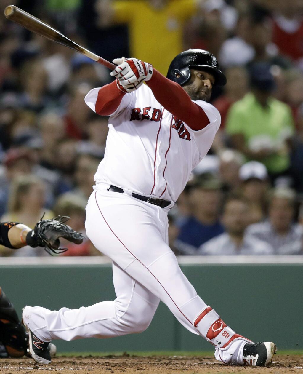 FILE - In this April 11, 2017, file photo, Boston Red Sox's Pablo Sandoval swings during the second inning of a baseball game against the Baltimore Orioles at Fenway Park in Boston. On Friday, July 14, 2017, the Red Sox announced that Sandoval had been designated for assignment after being activated from the 10-day disabled list. (AP Photo/Charles Krupa, File)