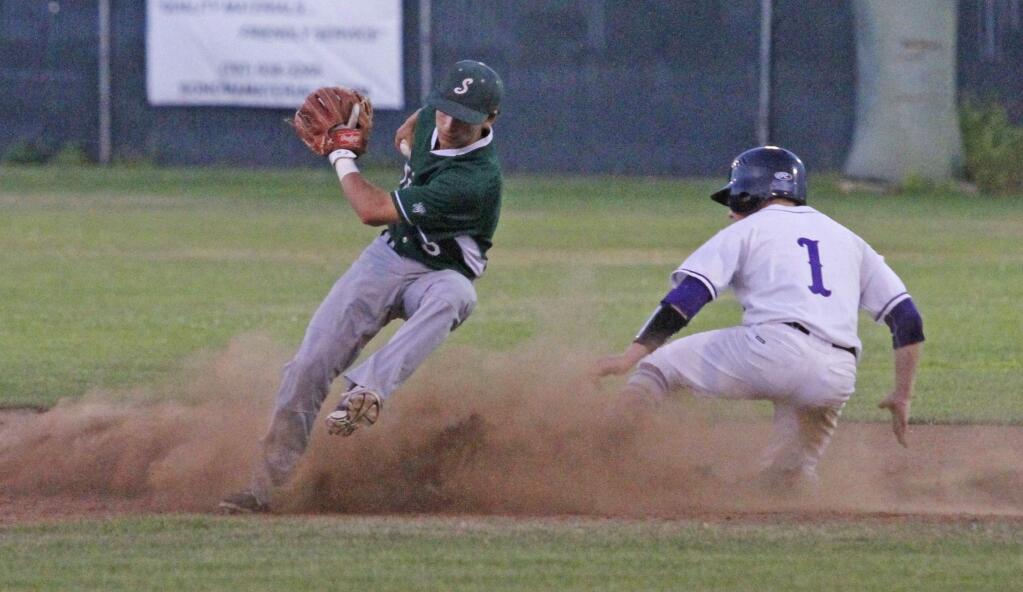 Bill Hoban/Index-TribuneSonoma second baseman Mac Scott gets out of the way of a Petaluma runner during Wednesday night's game. Sonoma won 2-0 and advanced to the SCL Tournament championship game Thursday night against Analy.