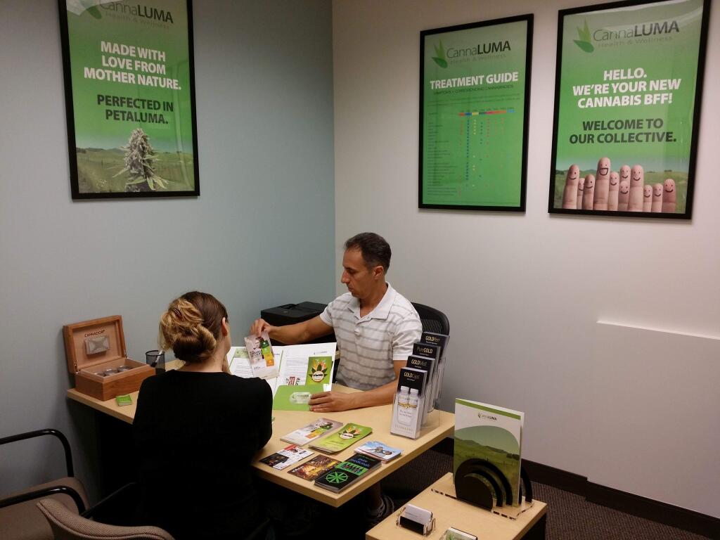 CannaLUMA's CEO, Anthony Nunes, consults with a new patient at the company's Petaluma office. (COURTESY CANNALUMA)