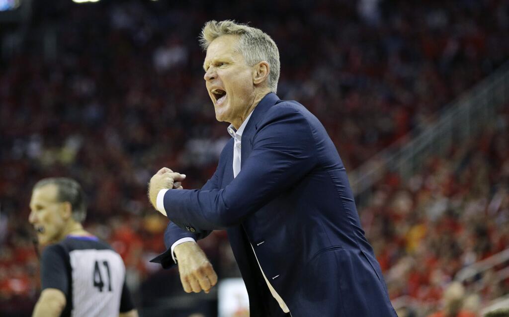 Golden State Warriors head coach Steve Kerr reacts to a call during the second half in Game 2 of the NBA Western Conference final against the Houston Rockets, Wednesday, May 16, 2018, in Houston. (AP Photo/David J. Phillip)