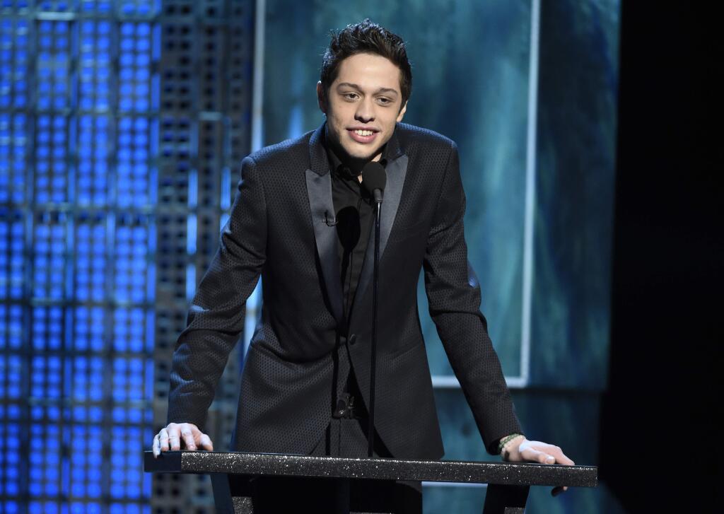 FILE - In this March 14, 2015, file photo, Pete Davidson speaks at a Comedy Central Roast at Sony Pictures Studios in Culver City. (Photo by Chris Pizzello/Invision/AP, File)