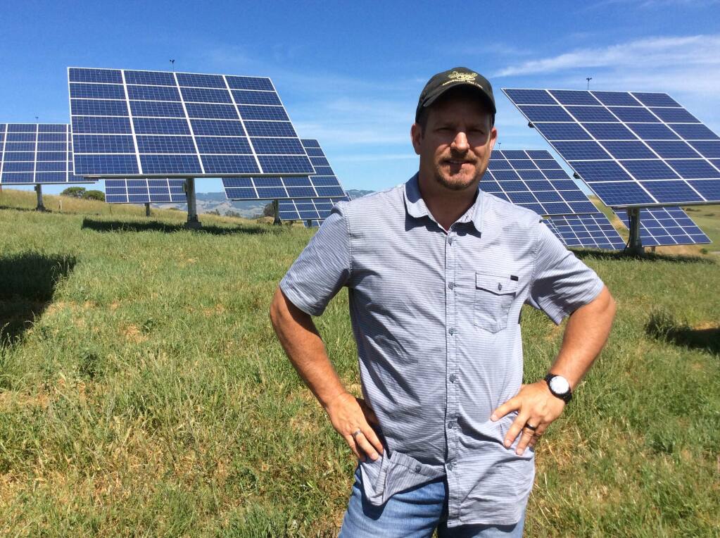 Mark Soiland stands in front of the solar array at Stony Point Quarry near Cotati.
