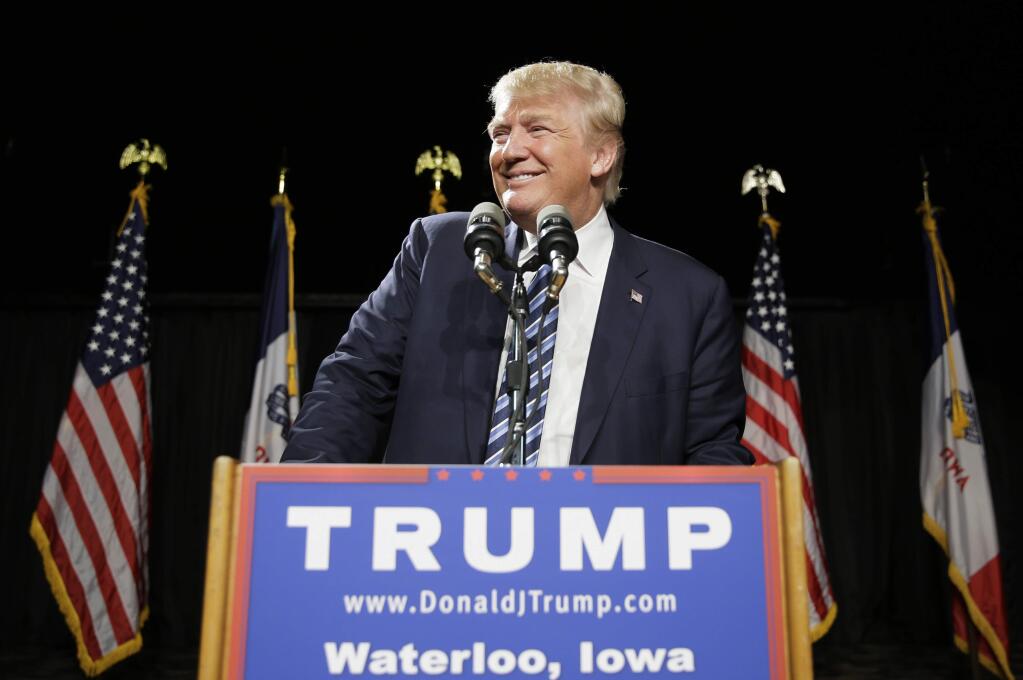 FILE - In this Oct. 7, 2015 file photo, Republican presidential candidate Donald Trump speaks during a campaign stop in Waterloo, Iowa. Trump has agreed to host 'Saturday Night Live' next month. NBC said its former 'Celebrity Apprentice' host will be the headliner of the Nov. 7 show. (AP Photo/Charlie Neibergall, File)