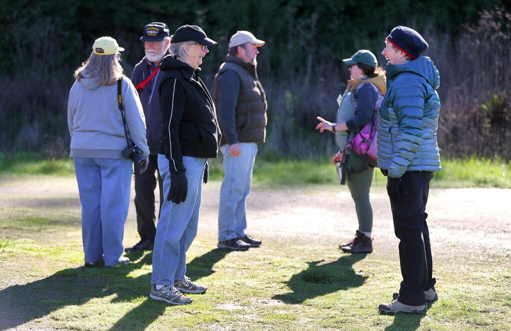 Carol Eber, right, and Siri Fenson take part in a observational exercise during a Senior Saunters walk at Riverfront Regional Park on Tuesday, February 5, 2019. The hike is part of a series of monthly walks put on by Sonoma County Regional Parks.(Christopher Chung/ The Press Democrat)