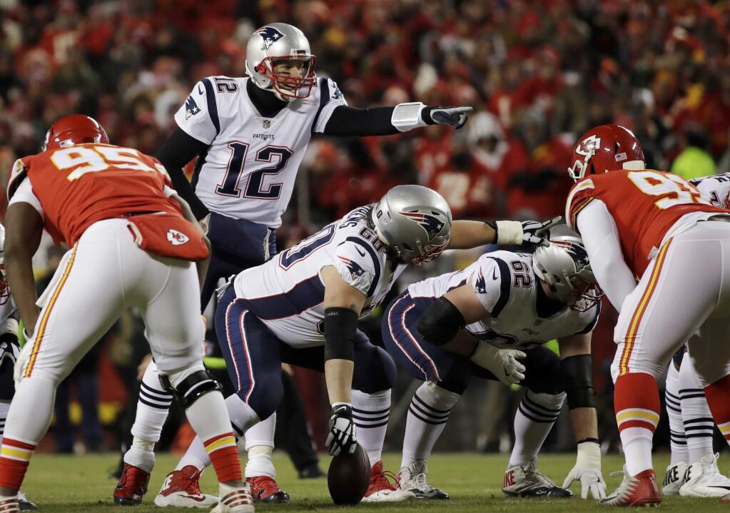 FILE - In this Jan. 20, 2019, file photo, New England Patriots quarterback Tom Brady (12) calls a play during the first half of the AFC championship NFL football game against the Kansas City Chiefs in Kansas City, Mo. We‚Äôre not likely to see much of Brady until opening day. We won‚Äôt see any of his buddy and standout tight end, Rob Gronkowski, whose battered body caused him to retire. It‚Äôs a big blow for the 42-year-old Brady, who somehow manages to overcome such obstacles. (AP Photo/Elise Amendola, File)