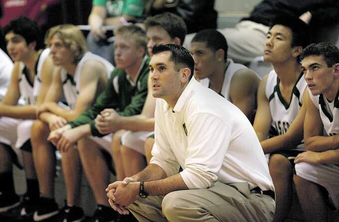 Casa coach James Forni watches with the bench as Casa beats Campolindo, 53-51, during the Russ Peterich Classic held at Montgomery High School in 2007. (Crista Jeremiason / The Press Democrat)