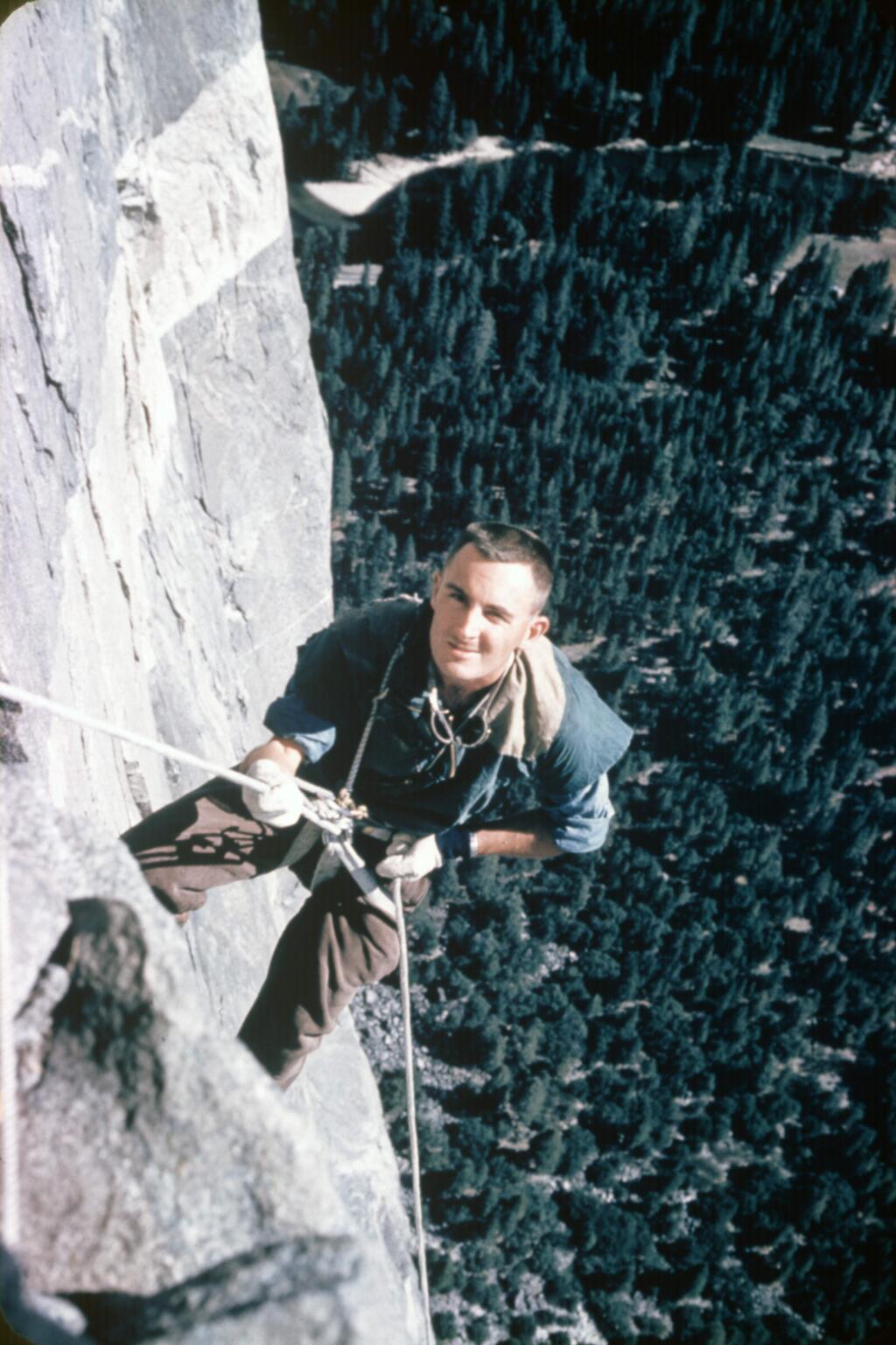 Wayne Merry of Calistoga inches his way upward to the top of El Capitan in November 1958. Perry and his partners were the first to scale the mountain in Yosemite. (Yosemite Climbing Association photo)