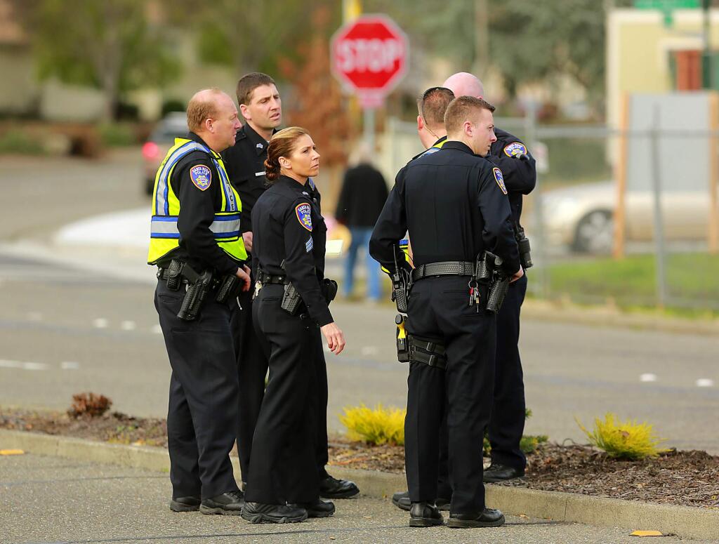 Santa Rosa police officers investigate the scene on Oakmont Drive where two women pedestrians were struck by a 77-year-old woman who was arrested for suspected driving under the influence on Wednesday, Jan. 20, 2016. (JOHN BURGESS / The Press Democrat)