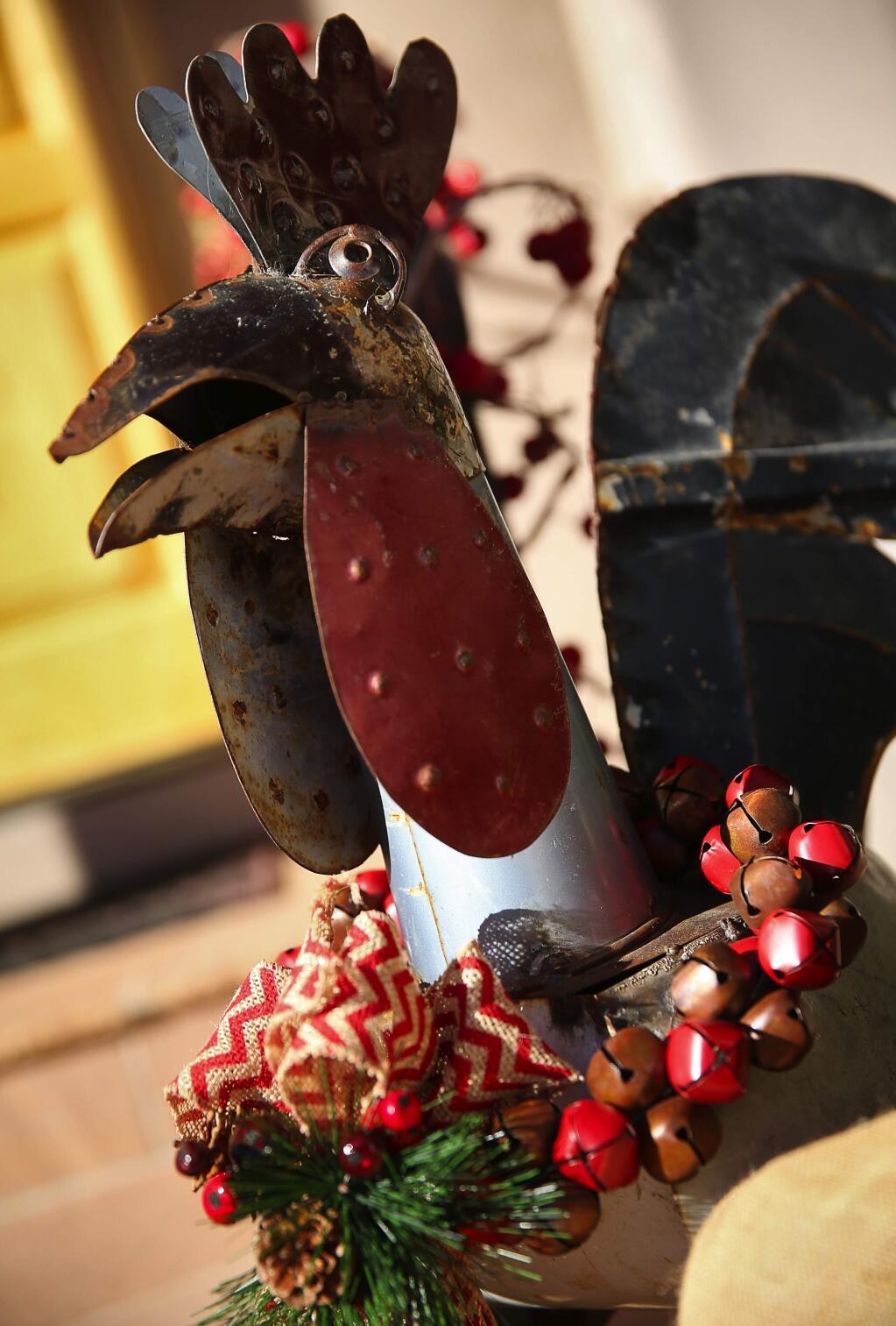 A metal chicken sculpture is decorated for the holidays at the home of Dianne and Tom Garcia. The home is featured on the Sebastopol Holiday Home Tour.(Christopher Chung/ The Press Democrat)