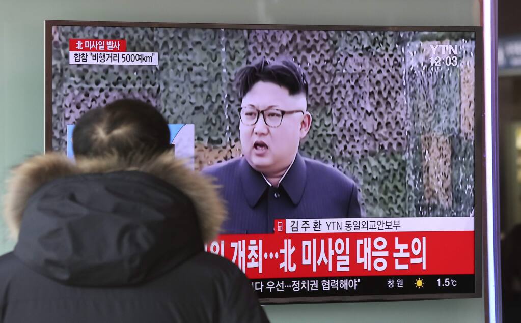 A man watches a TV news program showing a file footage of North Korean leader Kim Jong Un with letters reading: 'The North fired a missile' at the Seoul Train Station in Seoul, South Korea, Sunday, Feb. 12, 2017. North Korea reportedly fired a ballistic missile early Sunday in what would be its first such test of the year and an implicit challenge to President Donald Trump's new administration. Details of the launch, including the type of missile, were scant. (AP Photo/Lee Jin-man)