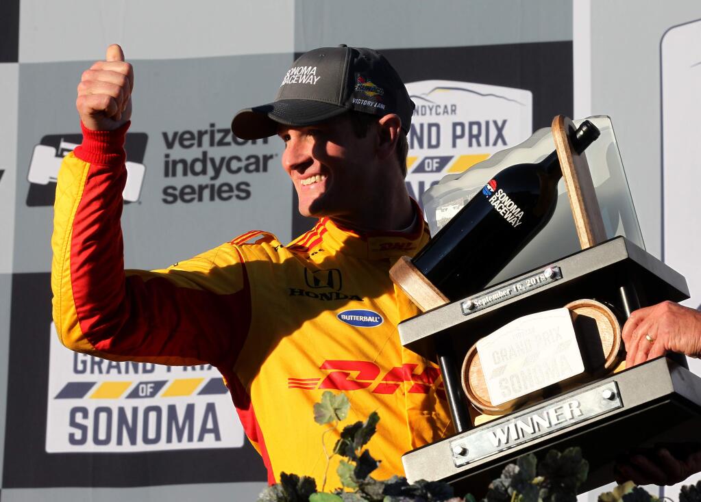Ryan Hunter-Reay celebrates his victory in the winner's circle after winning the IndyCar Grand Prix of Sonoma at Sonoma Raceway, on Sunday, September 16, 2018. (Photo by Darryl Bush / For The Press Democrat)