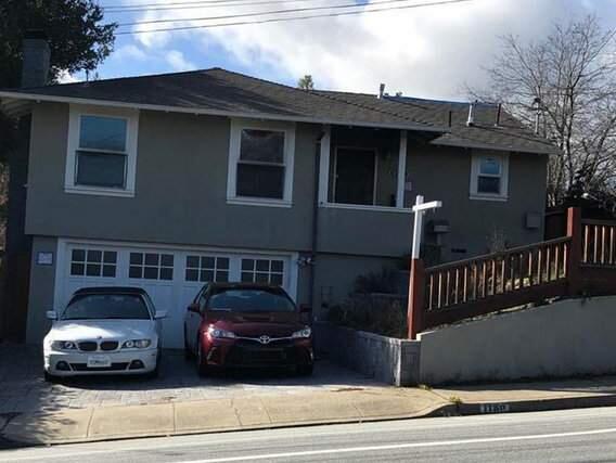 The fire-damaged home at 1180 Alameda in San Carlos is listed for $1.6 million. (REMAX.COM)