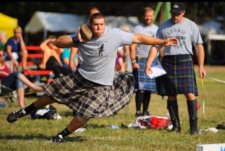 Gary Randolph competes in the stone put at a Scottish Games competition.