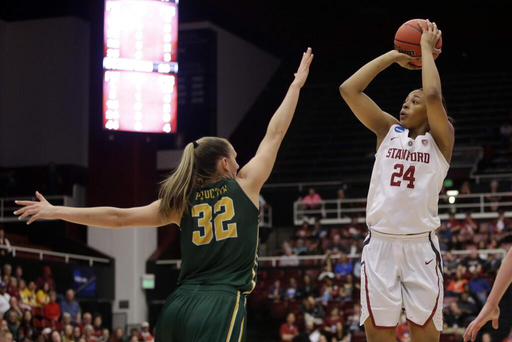 Stanford forward Erica McCall (24) shoots over San Francisco forward Taylor Proctor (32) in the first half of a game in the NCAA tournament Saturday, March 19, 2016, in Stanford. (AP Photo/Marcio Jose Sanchez)