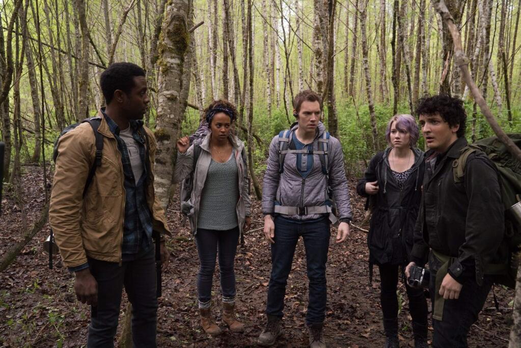 Vertigo EntertainmentJames (James Allen McCune, center) and a group of college friends venture into the woods where his sister disappeared in 'Blair Witch.'