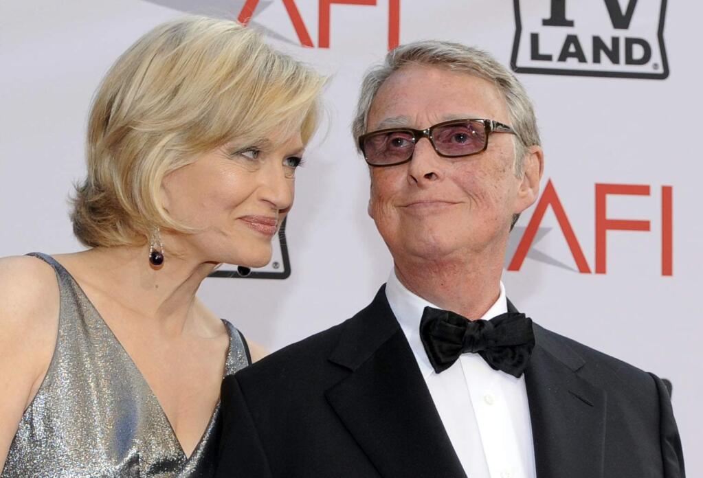 FILE - Journalist Diane Sawyer and director Mike Nichols arrive at the AFI Lifetime Achievement Awards honoring Mike Nichols, at Sony Pictures Studios in this June 10, 2010 file photo taken in Culver City, Calif. ABC News confirms director Mike Nichols and husband of Diane Sawyer died Wednesday evening Nov. 19, 2014. He was 83. (AP Photo/Chris Pizzello)