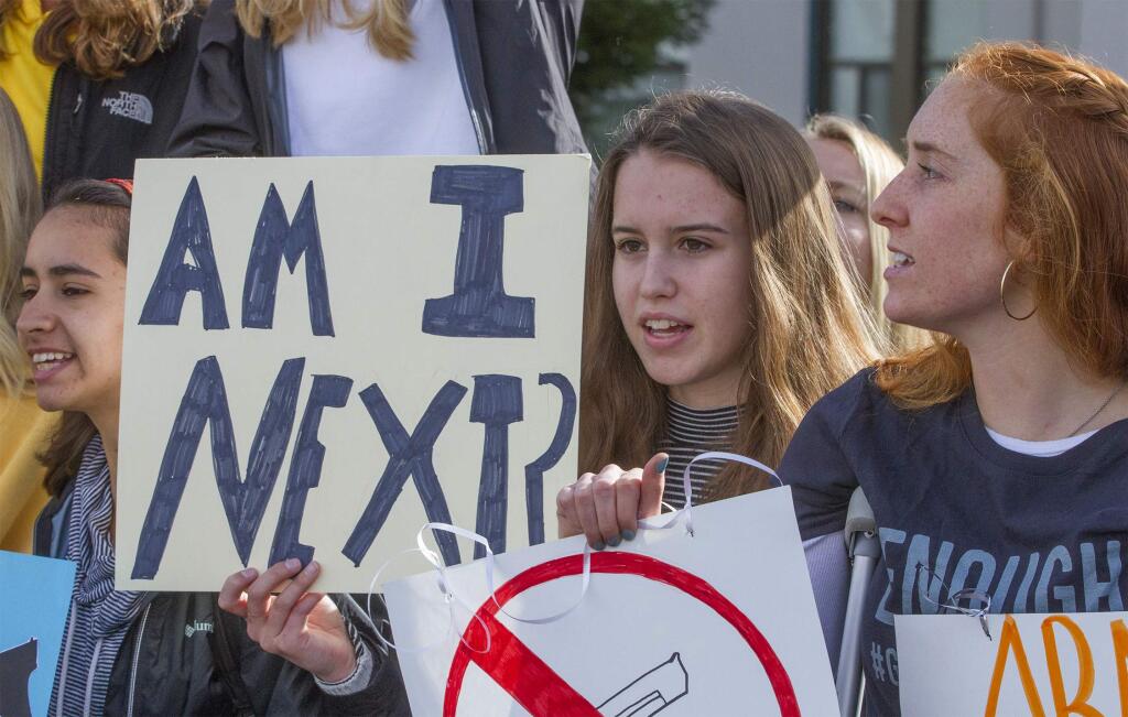 In solidarity with schools around the nation, students from Sonoma Valley High School walked out of their classes today to protest gun violence, remember the victims of the Parkland, Florida, school shooting, and insist on tougher gun laws. (Photo by Robbi Pengelly/Index-Tribune)