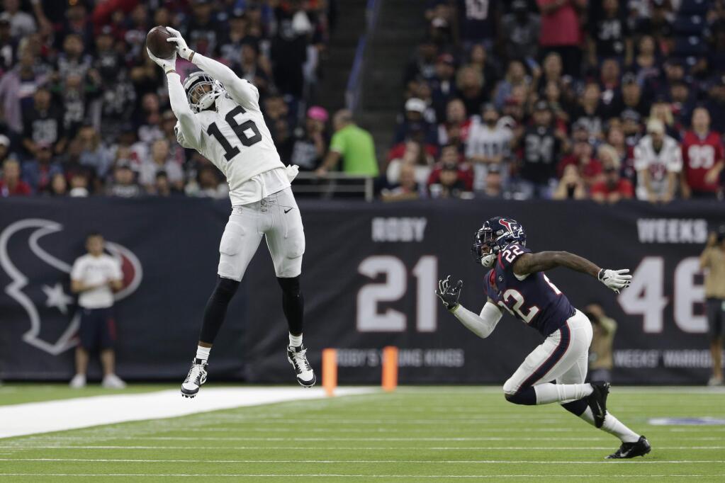 Oakland Raiders wide receiver Tyrell Williams, left, and Houston Texans cornerback Gareon Conley during the second half, Sunday, Oct. 27, 2019, in Houston. (AP Photo/Michael Wyke)