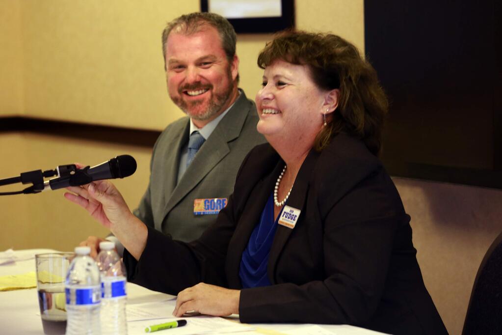 Candidates for the 4th District Supervisor James Gore, left, and Deb Fudge debated at the Best Western Wine Country Inn on Wednesday, September 24, 2014. (The Press Democrat)