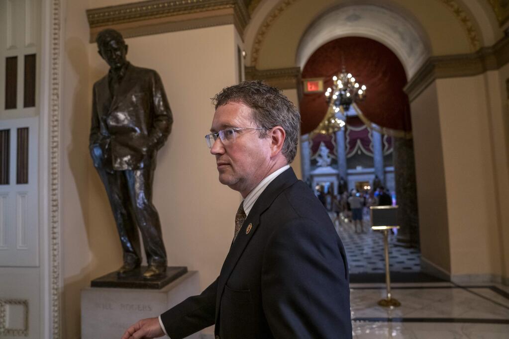 Republican, Rep. Thomas Massie, R-Ky., leaves after speaking to reporters at the Capitol where he blocked a unanimous consent vote on a long-awaited $19 billion disaster aid bill in the chamber on Tuesday, May 28, 2019. (AP Photo/J. Scott Applewhite)