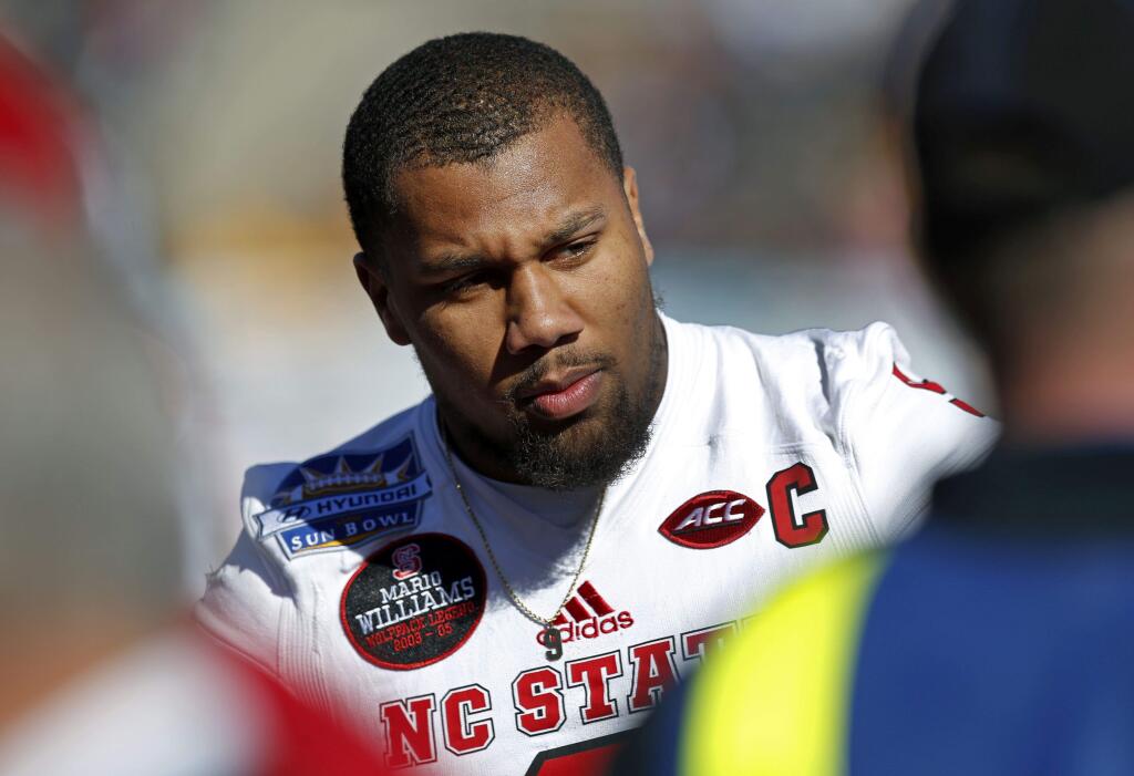 North Carolina State defensive end Bradley Chubb before the start of the Sun Bowl against Arizona State in El Paso, Texas, Friday, Dec. 29, 2017. (AP Photo/Andres Leighton)