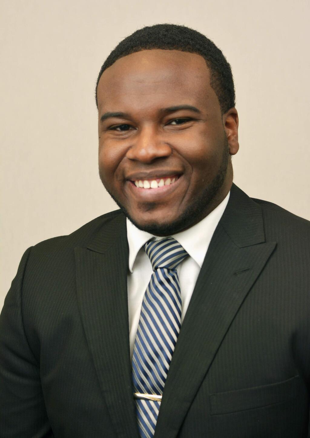 This Feb. 27, 2014, portrait provided by Harding University in Searcy, Ark., shows Botham Jean. Authorities said Friday, Sept. 7, 2018, that a Dallas police officer returning home from work shot and killed Jean, a neighbor, after she said she mistook his apartment for her own. The officer called dispatch to report that she had shot the man Thursday night, police said. (Jeff Montgomery/Harding University via AP)
