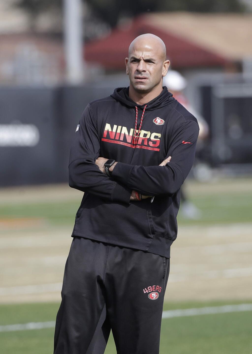 San Francisco 49ers defensive coordinator Robert Saleh watches as players practice at the team's training facility in Santa Clara, Thursday, Jan. 23, 2020. The 49ers will face the Kansas City Chiefs in Super Bowl LIV. (AP Photo/Jeff Chiu)