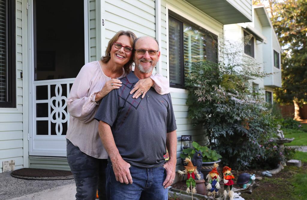 Megan and Mike Cramer downsized to a condominium in Cotati, from their home in Rohnert Park, last year. The change allows them to do less home maintenance.(Christopher Chung/ The Press Democrat)