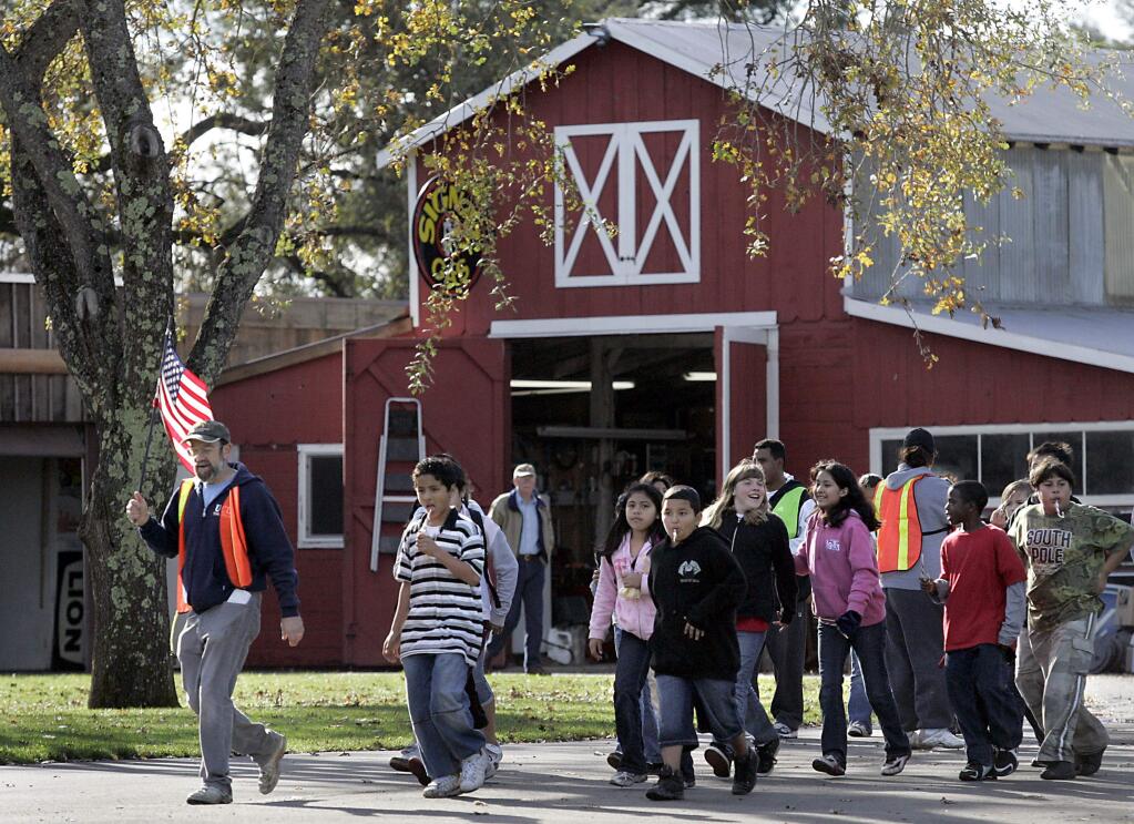 Teacher Jeff Tobes of Helen Lehman school leads his class away from the Stoke Ranch in Santa Rosa on their way to the bowling alley in Windsor in 2008. (Press Democrat files)