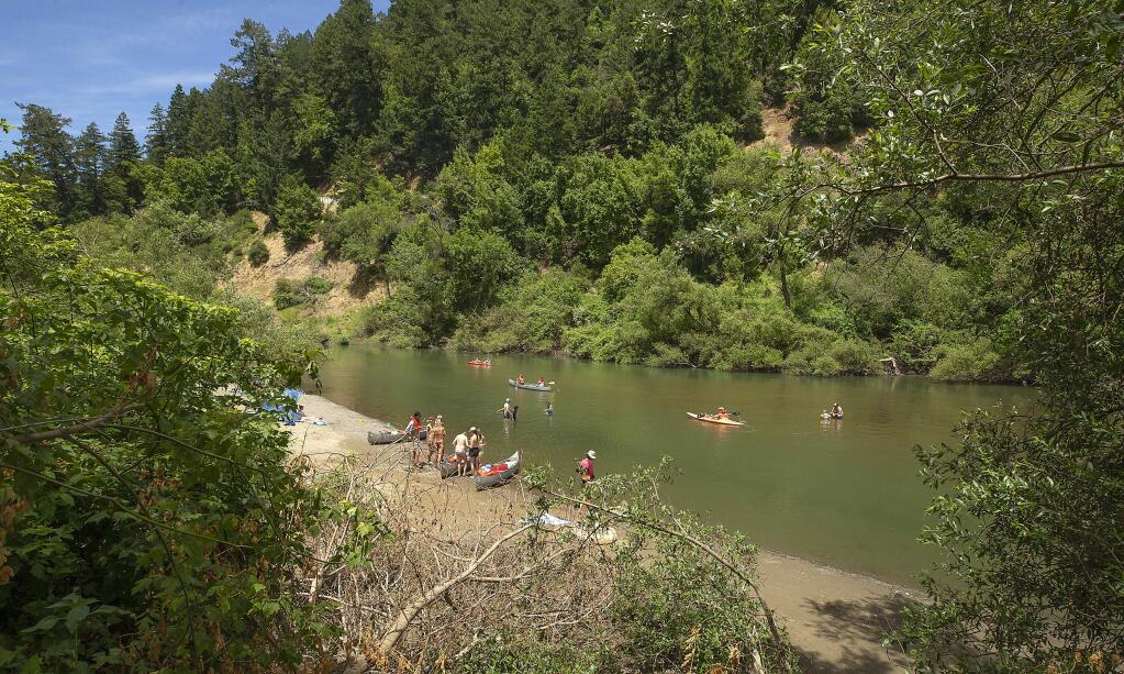 photos by John Burgess / The Press Democrat Mother's Beach is suddenly a lot smaller because of powerful river flows that have reshaped the Russian River near Hacienda Bridge in Forestville.