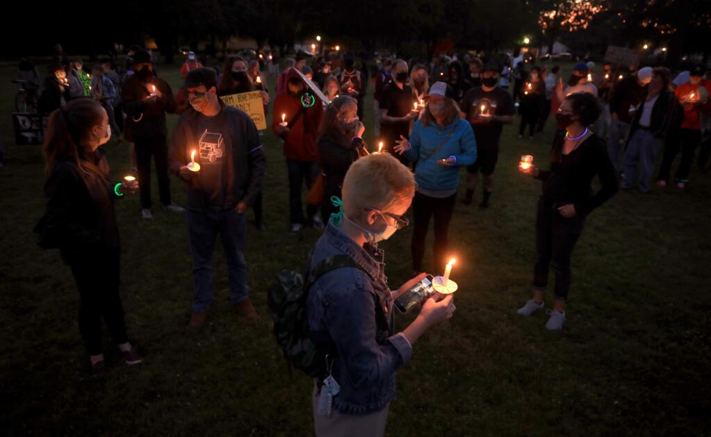 Protesters get ready to march from Julliard Park In Santa Rosa, Saturday, June 20, 2020 to the Santa Rosa Police Department. (Kent Porter / The Press Democrat) 2020