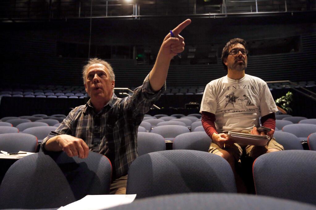 Gene Abravaya, left, gives instructions to actors on stage as he and co-director David Yen oversee rehearsal for the Spreckels Theatre Company production of Disney's Tarzan at Spreckels Center for Performing Arts in Rohnert Park, California, on Tuesday, April 25, 2017. (Alvin Jornada / The Press Democrat)