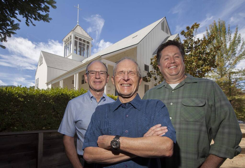 (From left) Ron Moser (both he and his husband attend St. Andrew); Richard Gantenbein, minister at St. Andrew; Michael Weiss (both he and his partner, Brian, have attended since 2000). Both church members spoke at the service. (Photo by Robbi Pengelly/Index-Tribune)