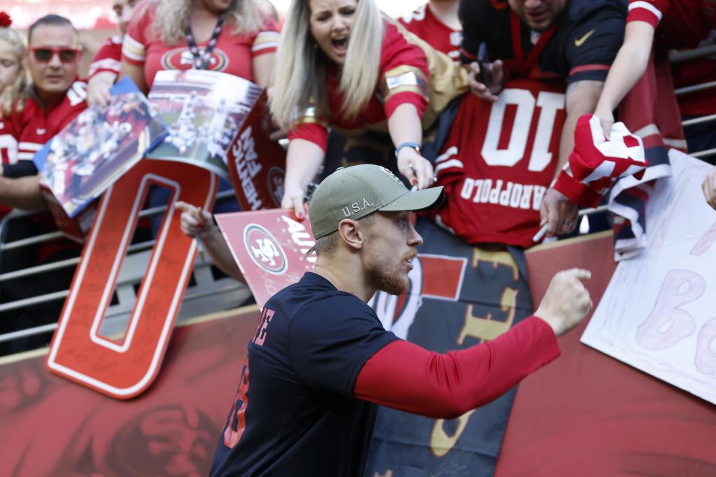 San Francisco 49ers tight end George Kittle greets fans before a game against the Arizona Cardinals in Santa Clara, Sunday, Nov. 17, 2019. (AP Photo/Josie Lepe)