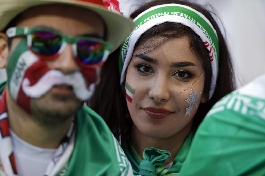 Iranian fans wait for the start of the group B match between Iran and Spain at the 2018 soccer World Cup in the Kazan Arena in Kazan, Russia, Wednesday, June 20, 2018. (AP Photo/Manu Fernandez)
