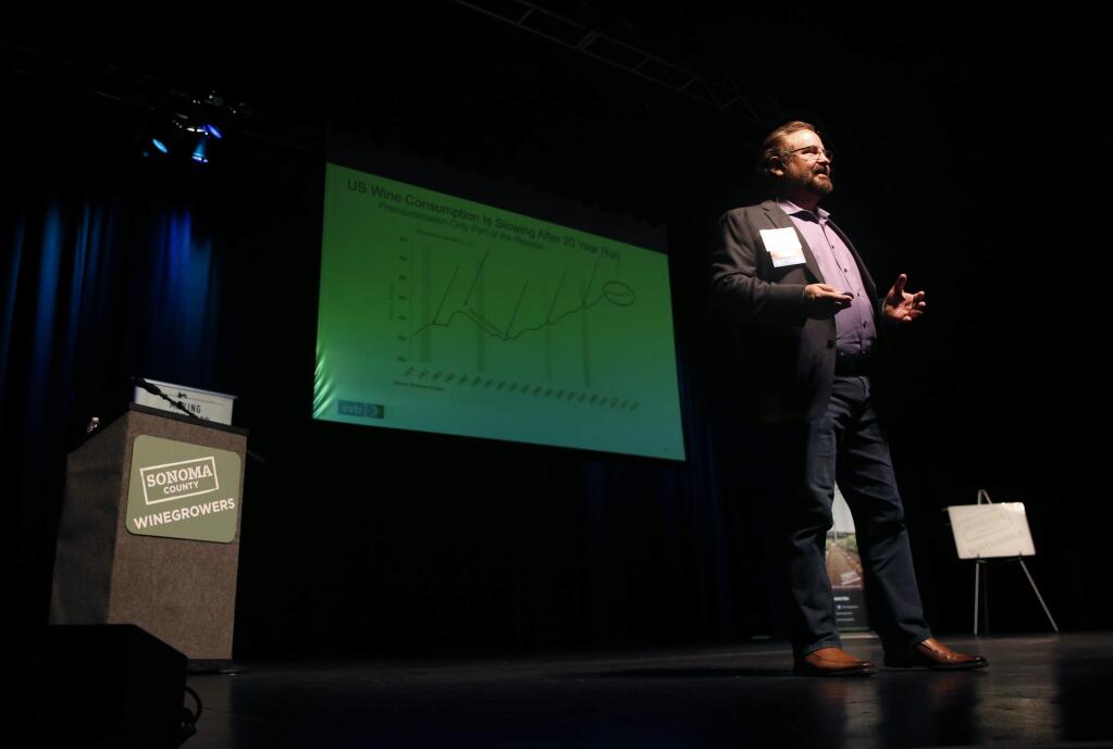 Rob McMillan, Executive Vice President and Founder of Silicon Valley Bank's wine division, speaks to the crowd during the Dollars and Sense Seminar and Trade Show at the Luther Burbank Center for the Arts in Santa Rosa, on Thursday, January 11, 2018. (BETH SCHLANKER/ The Press Democrat)